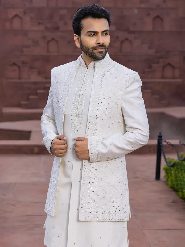 classy_white_raw_silk_indowestern_for_wedding_173296183813121